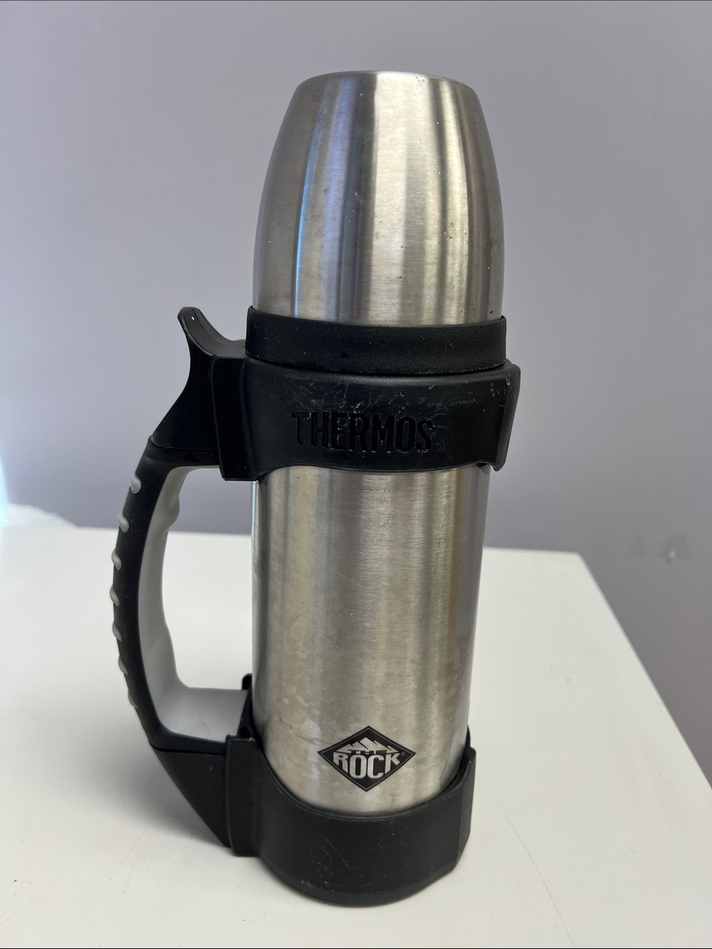 Thermos Stainless Steel “The Rock” Travel Bottle in Silver with Black Accents